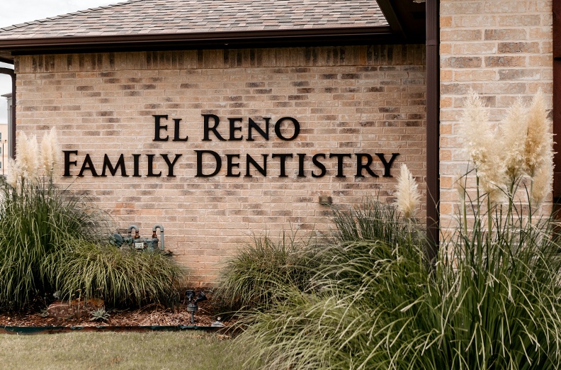 El Reno Family Dentistry sign on dental office building
