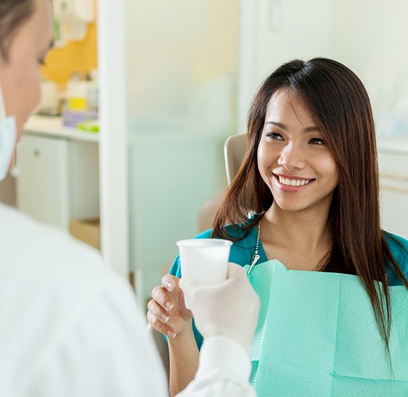 Smiling woman at dental checkup
