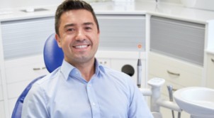 Man in dental office for preventive dentistry